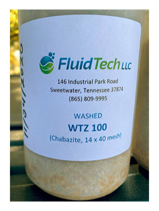 Sample jar of Fluid Tech washed WTZ chabazite zeolite (WTZ 100 sample shown)